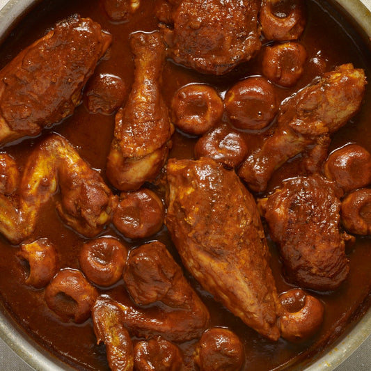 Chicken in Mole or Alfredo Sauce